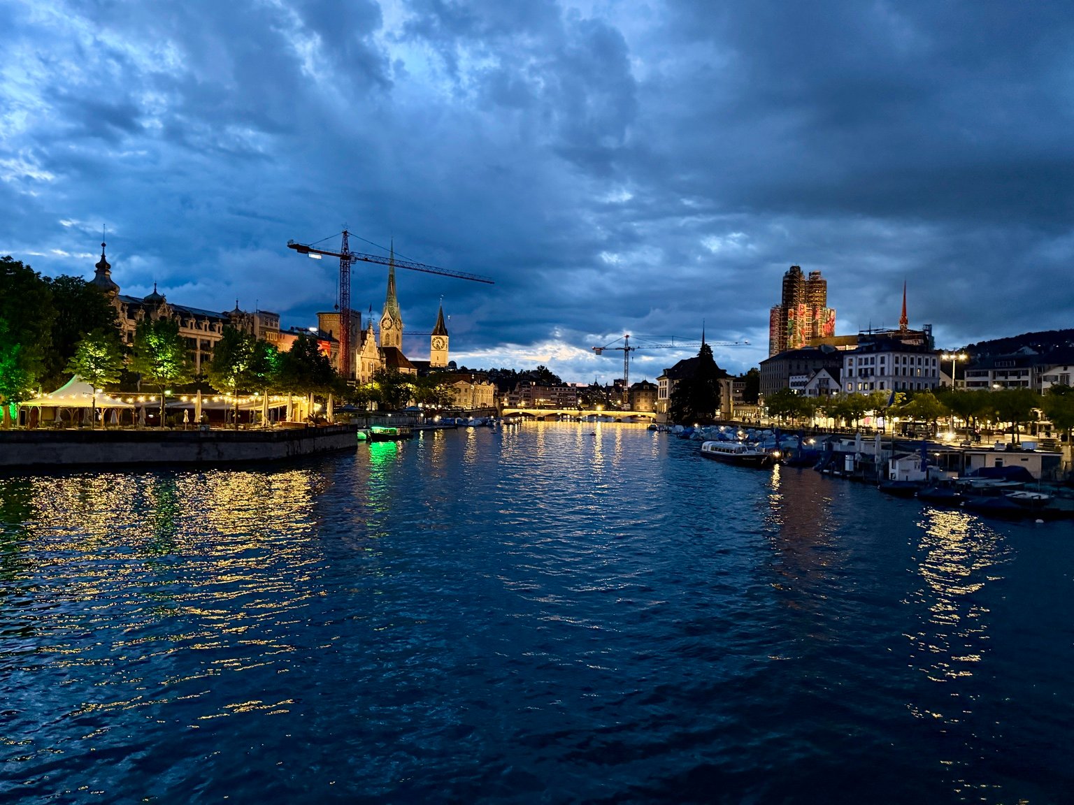 Zürich waterfront under a dramatic evening sky